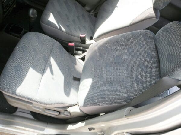 A car seat with the seats folded down.