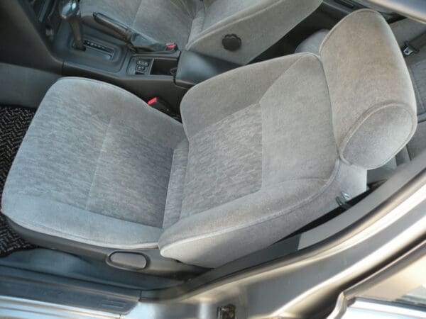 A car seat with two seats in it