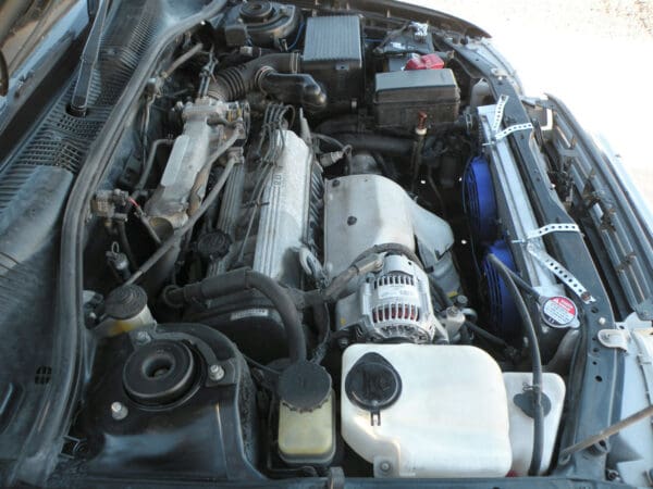 A car engine with many different parts on it
