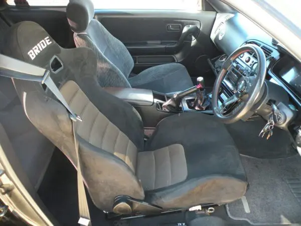 Car interior with Bride racing seat.