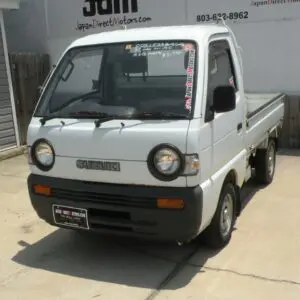 White Suzuki mini truck for sale.
