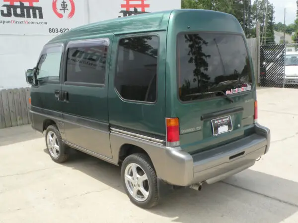 Green Subaru Domingo CV van rear view.