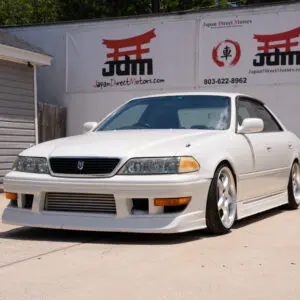 White Toyota Mark II JZX100 sedan