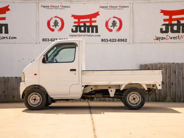 White Japanese mini truck for sale.