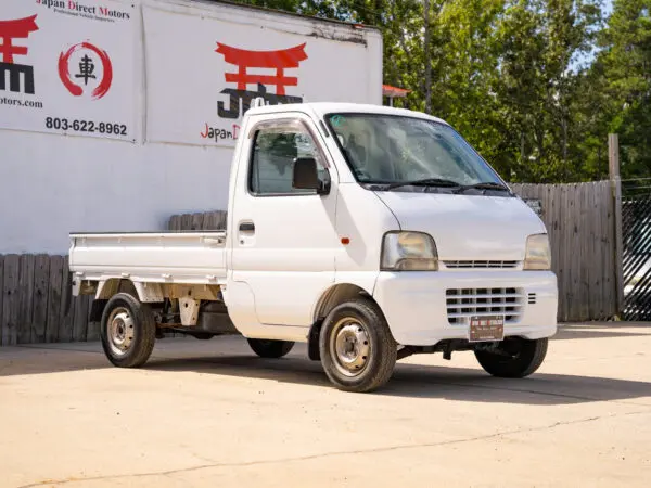 White Japanese mini truck for sale.