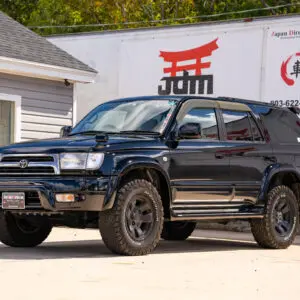 Black Toyota Land Cruiser SUV parked.