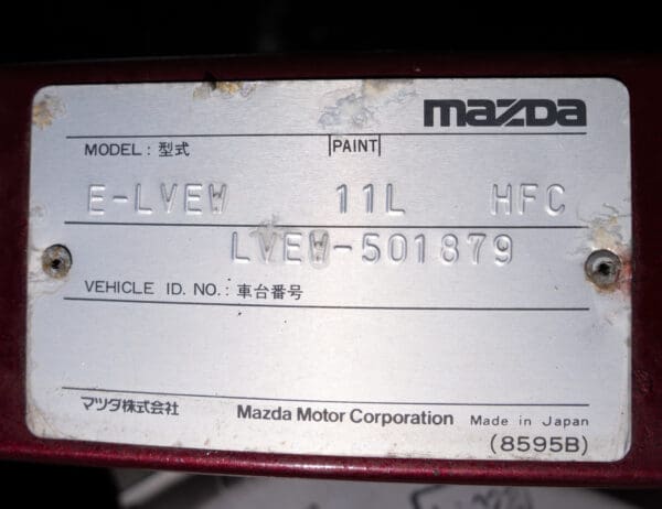 Mazda vehicle ID plate: LVEW-501879