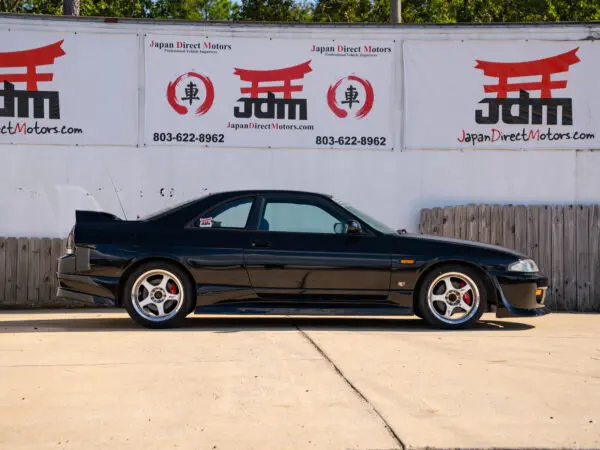 Black Nissan Skyline R33 coupe.