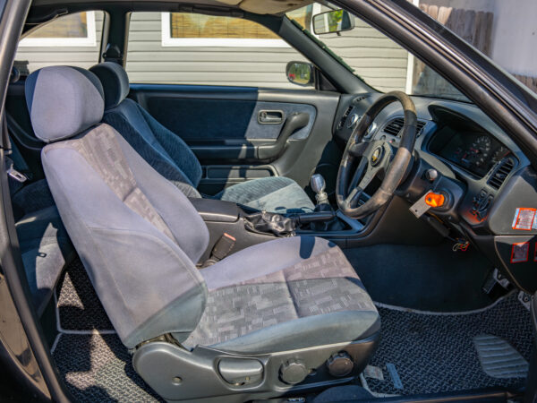 Interior of a grey sports car.