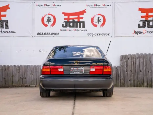 Black Lexus Celsior rear view.