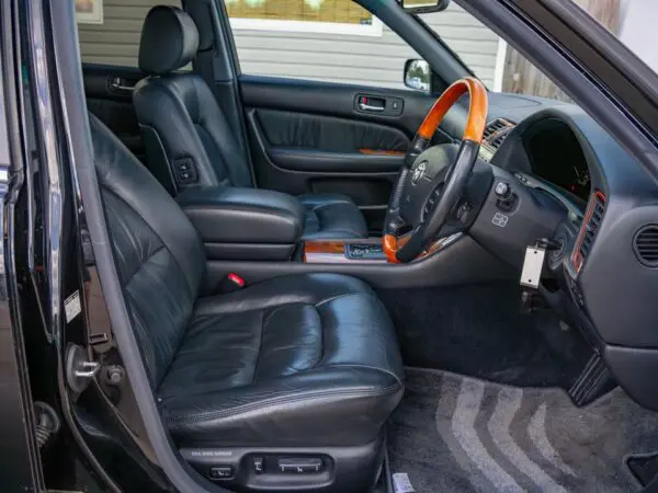 Black leather interior of a car.