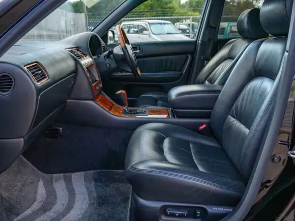 Black leather interior of a Lexus LS400.