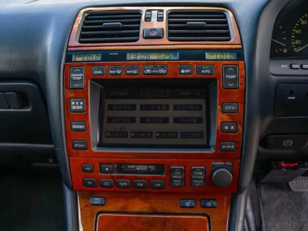 Car dashboard with navigation system and climate control.