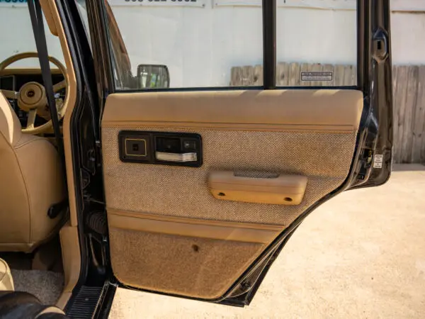 Black Jeep Cherokee interior door panel.