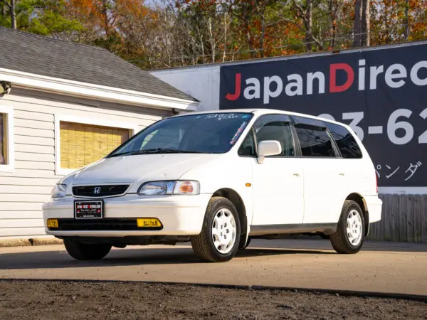 White Honda Odyssey minivan, JapanDirect Motors.