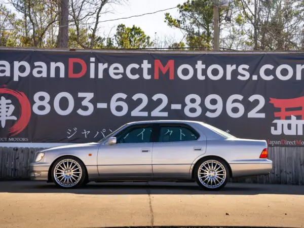 Silver Lexus LS400 parked outdoors.