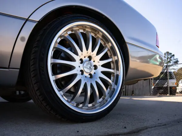 Silver car's Carlsson alloy wheel.