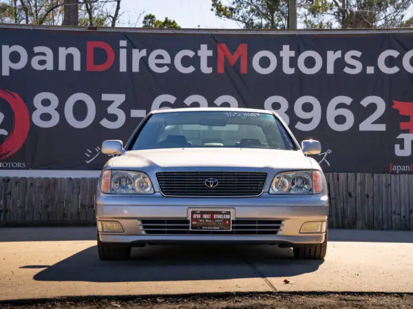 Silver Lexus LS400 front view.