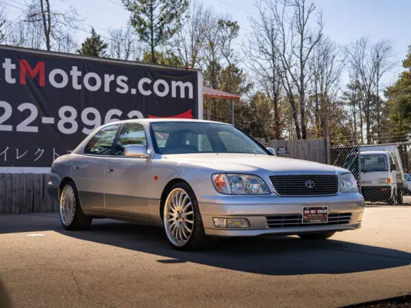 Silver Lexus LS400 parked outdoors.