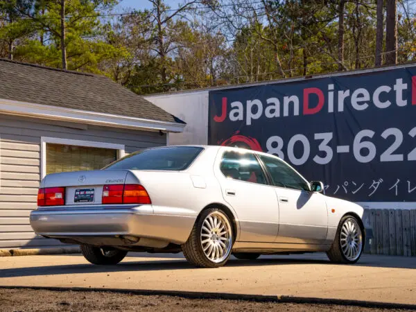 Silver Lexus LS400 parked outdoors.