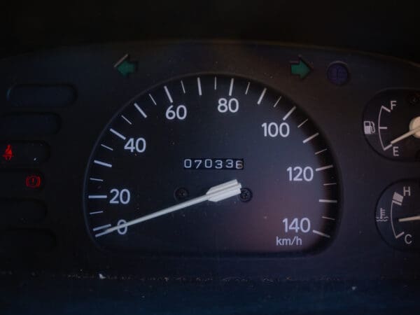 Car speedometer showing 070336 km.