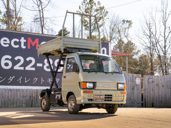 Tan Hijet mini dump truck for sale.