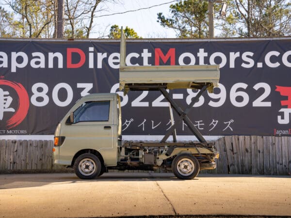 Tan mini truck, Japan Direct Motors.